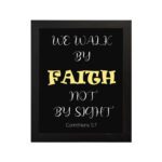 Infidu We Walk By Faith Not By Sight Corinthians 5:7 Bible Wall Art with the black background, yellow and white font black frame hung on the wall