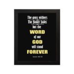 Infidu The Grass Withers The Flower Fades But The Word Of Our God Will Stand Forever Isaiah 40:8 Bible Wall Art and black frame hung on the wall