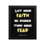 Christian wall art with Hebrews 13:6 verse on a black background, yellow and white font black frame hung on the wall