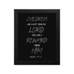 Bible wall art featuring the quote 'Children are a gift from the LORD, they are a reward from Him' from Psalm 127:3. hung on the wall in a black frame