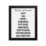 Infidu wall art displays The Fruit of the Spirit with values like Love, Joy, Peace, and more on a black background. Wall Art hung on the wall in a black frame