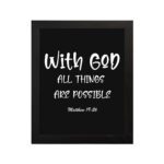 With God, All Things Are Possible Matthew 19:26 white text on black background Christian wall art hung on the wall in a black frame