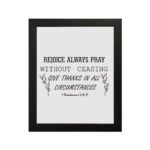 Infidu wall art featuring the text Rejoice Always Pray Without Ceasing. Give Thanks in All Circumstances with floral accents. hung on the wall in a black frame