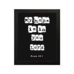 My Hope Is In You Lord' Psalm 39:7 Bible verse wall art with white squares on a black background. Wall Art hung on the wall in a black frame