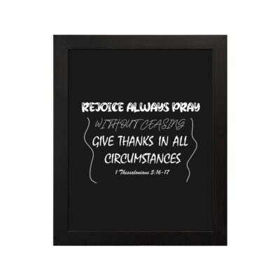 Christian wall art with bold white text on a black background reading Rejoice always, pray without ceasing, give thanks from 1 Thessalonians 5:16-17. hung on the wall in a black frame