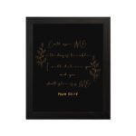 Infidu Call Upon Me In The Day Of Trouble Psalm 50:15 Bible Wall Art with gold text on a black background and subtle leaf illustrations. Wall Art hung on the wall in a black frame