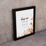 Keep Me As The Apple Of Your Eye Psalm 17:8 Bible Verse Wall Art with watercolor fruits and flowers. Wall Art displayed on the wall in black frame