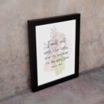 Psalm 18:3 Bible Wall Art with a soft pastel background and light green and beige leaves, featuring dark, elegant text. Wall Art hung on the wall in a black frame