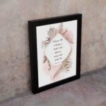 Psalm 50:15 Bible Wall Art with elegant black text, botanical patterns, and pink watercolor accents on a pale white background. Wall Art displayed on the wall in a black frame