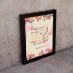 Psalm 50:15 Bible Verse Wall Art with colorful text, floral patterns, bird illustration, and beige background. Wall Art displayed on the wall in a black frame