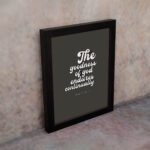 The Goodness of God Endures Continually Psalm 52:1 Christian wall art with white text on a dark gray background. Wall Art displayed on the wall in black frame