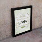 Infidu Isaiah 60:22 Christian wall art with gold text on mint green background, featuring LORD in larger black and beige letters. Wall Art displayed on the wall in a black frame