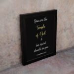 Infidu You Are The Temple Of God & His Spirit Dwells In You 1 Corinthians 3:16 Bible Wall Art with Purple Blue Background, Black Leaf Design, and White Font - Perfect Christian Home Decor and black frame on the wall