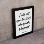 I Will Call Upon The Lord Psalm 18:3 Christian wall art with bold script font on a white background. Wall Art displayed on the wall in a black frame