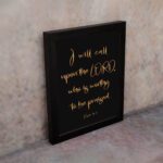 Psalm 18:3 wall art with gold text I will call upon the Lord on a black background in a black frame. Christian home decor. displayed on the wall in a black frame