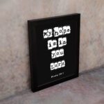 My Hope Is In You Lord' Psalm 39:7 Bible verse wall art with white squares on a black background. Wall Art displayed on the wall in a black frame