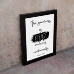 Infidu The Goodness Of God Endures Continually Psalm 52:1 Bible Wall Art with black text and brushstroke design on white background. Wall Art displayed on the wall in a black frame