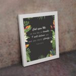 Psalm 50:15 Bible Verse Wall Art with white text, tropical leaves, and black background. Wall Art displayed on the wall in a white frame