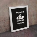 Infidu The Goodness Of God Endures Continually Psalm 52:1 Christian wall art with bold white text on a black background. Wall Art displayed on the wall in a white frame