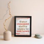 All Your Children Shall Be Taught By The Lord Isaiah 54:13 Christian Wall Art with red, brown, and beige tones. Wall Art displayed on the wall in a black frame