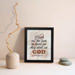 Blessed Are The Pure In Heart For They Shall See God Matthew 5:8 Christian Wall Art with earthy tones and splattered texture. Wall Art hung on the wall in a black frame