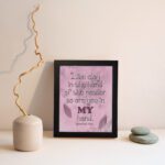 Infidu Jeremiah 18:6 Christian wall art with dark brown cursive text and bold 'MY' in brownish-purple, on a light pink background with leaf patterns. Wall Art displayed on the wall in a black frame