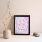 Infidu Jeremiah 18:6 Christian wall art with purple and pink cursive text, bold 'MY,' and a pastel watercolor background with a blue vine frame. Wall Art displayed on the wall in a black frame