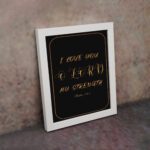 I LOVE YOU O LORD MY STRENGTH gold text on a black background, framed in gold and black - Christian wall art for home decor displayed on the wall in a white frame