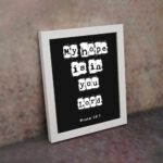 My Hope Is In You Lord' Psalm 39:7 Bible verse wall art with white squares on a black background. Wall Art displayed on the wall in a white frame