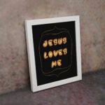 I Am a Child of God Bible wall art with bold gold text and a decorative gold border on a black background. Wall Art displayed on the wall in a white frame