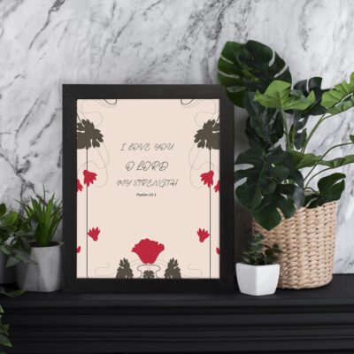 I Love You O Lord My Strength Psalm 18:1 Bible Wall Art with red flowers and dark leaves on a beige background. Wall Art displayed on the wall in a black frame