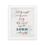 Zechariah 4:6 Christian Wall Art with minimalist design, dark brown text, and teal LORD on a light white floral background. Wall Art hung on the wall in a white frame