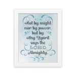 Zechariah 4:6 Bible verse wall art with light blue and white text, decorative flourishes, and a light blue gradient background. Inspiring Christian home decor. Wall Art hung on the wall in a white frame