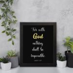 Luke 1:37 Bible verse wall art with black background, yellow highlights on God and Impossible. Christian home decor by Infidu. Wall Art displayed on the wall in a black frame