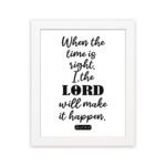 Infidu wall art displaying When the time is right, I, the LORD will make it happen in black text on a white background. hung on the wall in a white frame