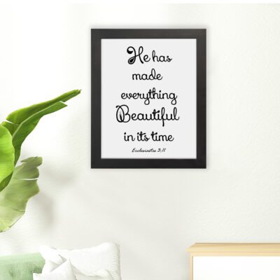 He Has Made Everything Beautiful Ecclesiastes 3:11 Bible Wall Art with black text on a white background. hung on the floor in a black frame