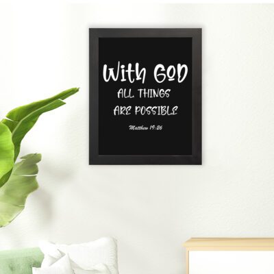 With God, All Things Are Possible Matthew 19:26 white text on black background Christian wall art hung on the floor in a black frame