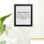 Infidu wall art featuring the text Rejoice Always Pray Without Ceasing. Give Thanks in All Circumstances with floral accents. hung on the floor in a black frame