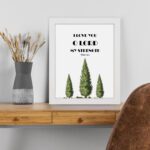 Psalm 18:1 Bible Wall Art with bold text and green trees on a white background. Wall Art displayed on the table in a white frame