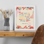 Psalm 50:15 Bible Verse Wall Art with colorful text, floral patterns, bird illustration, and beige background. Wall Art displayed on the table in a white frame