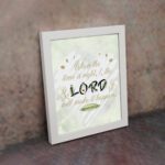 Infidu Isaiah 60:22 Christian wall art with gold text on mint green background, featuring LORD in larger black and beige letters. Wall Art displayed on the wall in a white frame