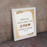 Christian wall art featuring Isaiah 60:22 with elegant text and a peach background, highlighting 'The Lord will make it happen. Wall Art displayed on the wall in a white frame