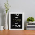 Psalm 18:1 Bible verse wall art with I LOVE YOU in white and O LORD in yellow on a black background. Christian decor by Infidu. Wall Art on the wall in a white table