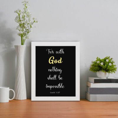 Luke 1:37 Bible verse wall art with black background, yellow highlights on God and Impossible. Christian home decor by Infidu. Wall Art displayed on the table in a white frame