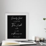 Infidu wall art featuring Psalm 54:4 with white text on a black background, displaying the quote about God's support. displayed on the table in a white frame