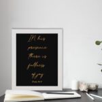 In His presence, there is fullness of joy in gold cursive text on a black background with Psalm 16:11 displayed on the table in a white frame - Christian wall art for home decor.