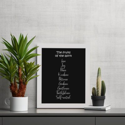 Infidu wall art displays The Fruit of the Spirit with values like Love, Joy, Peace, and more on a black background. Wall Art displayed on the white in a black frame