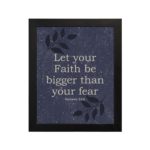 Christian wall art with Hebrews 13:6 verse on purple-blue background with leaf design black frame hung on the wall