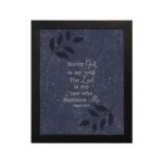 Christian wall art with Psalm 54:4 text on Purple Blue Color background, black leaf design, white font black frame hung on the wall