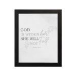 Christian wall art featuring the verse God Is Within Her; She Will Not Fall from Psalm 46:5 on a gray background with a gray leaf design and black and gray font black frame hung on the wall.